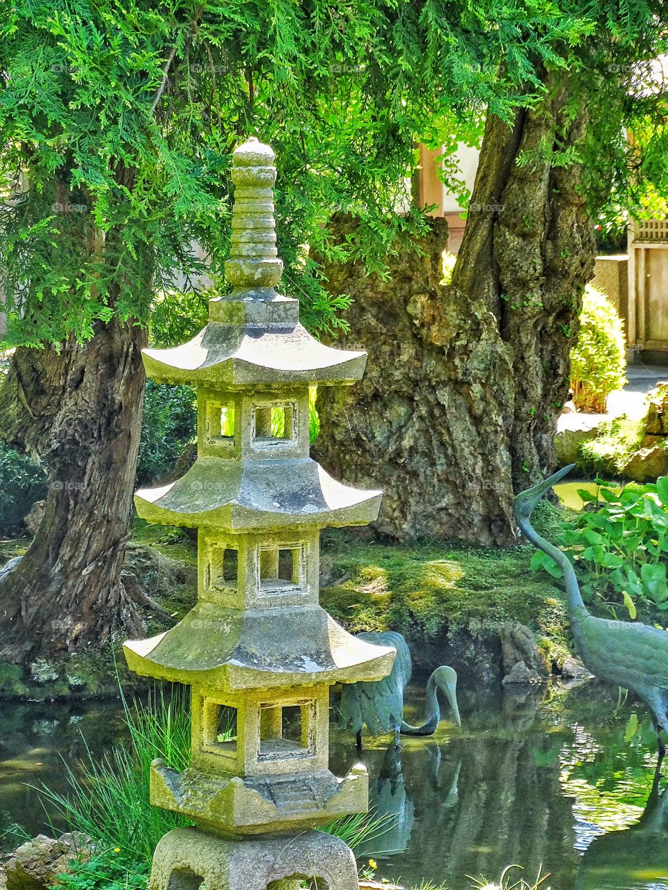 Japanese Shinto Shrine. Japanese Shrine In A Tranquil Garden
