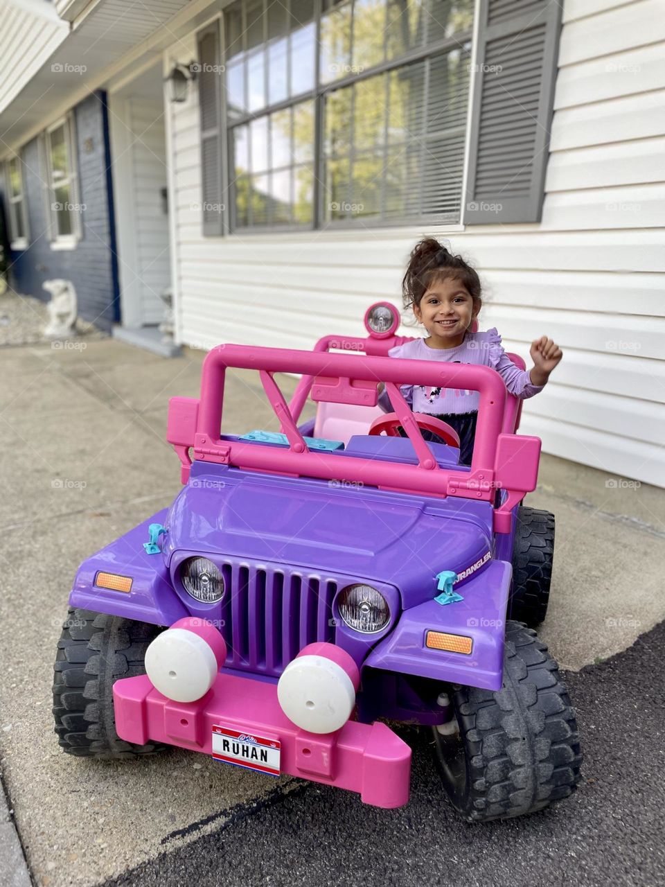 Little girl excited about Jeep, power wheels Jeep with little girl driving, excited while driving, purple and pink power wheels Jeep 