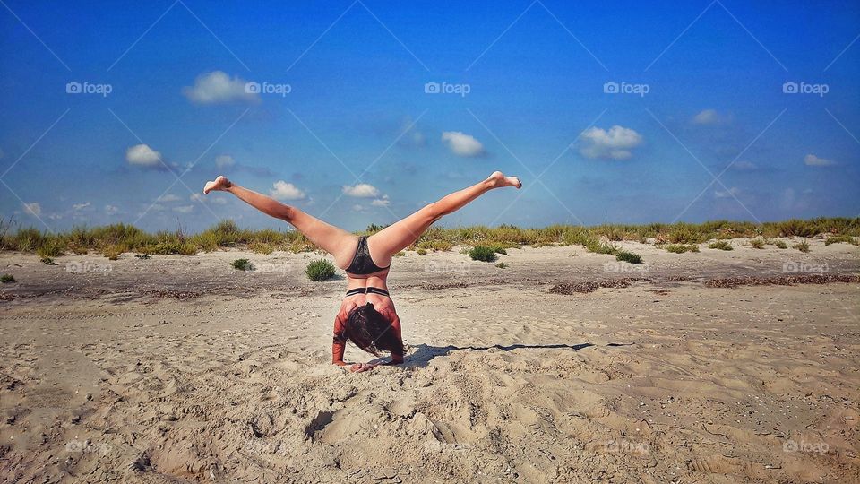 I love doing gymnastics. I especially liked playing sports on the seashore, in the sun, on the sand.