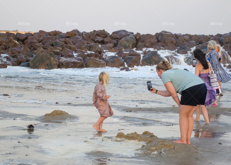 Mother Recording a Video