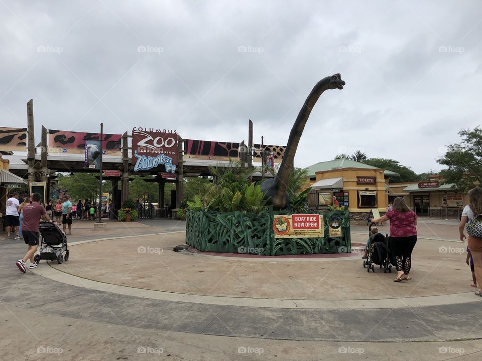 Columbus Zoo Entrance with Dinosaur Island Ride Ad Sign