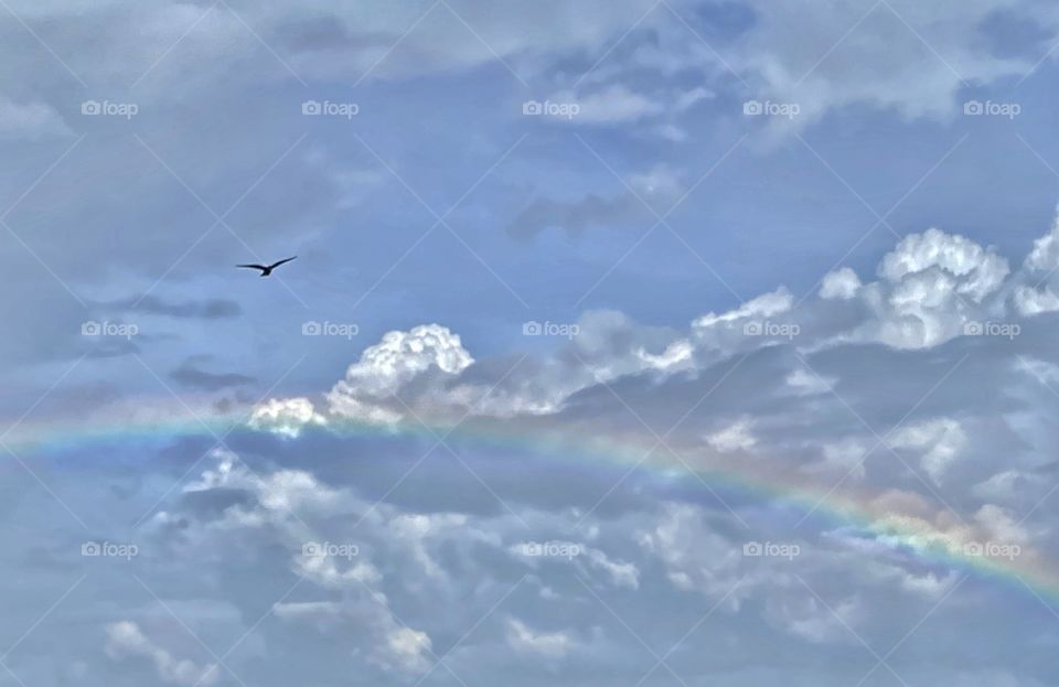 Rain clouds and rainbow 