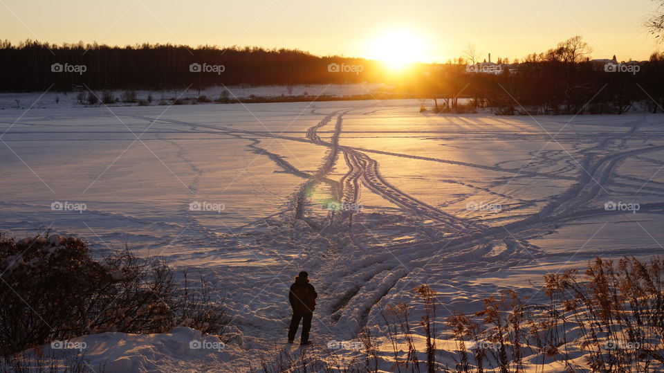 High angle view of person standing in snow