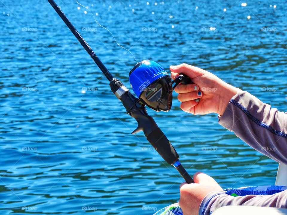 Fishing Pole In Skillful Hands
