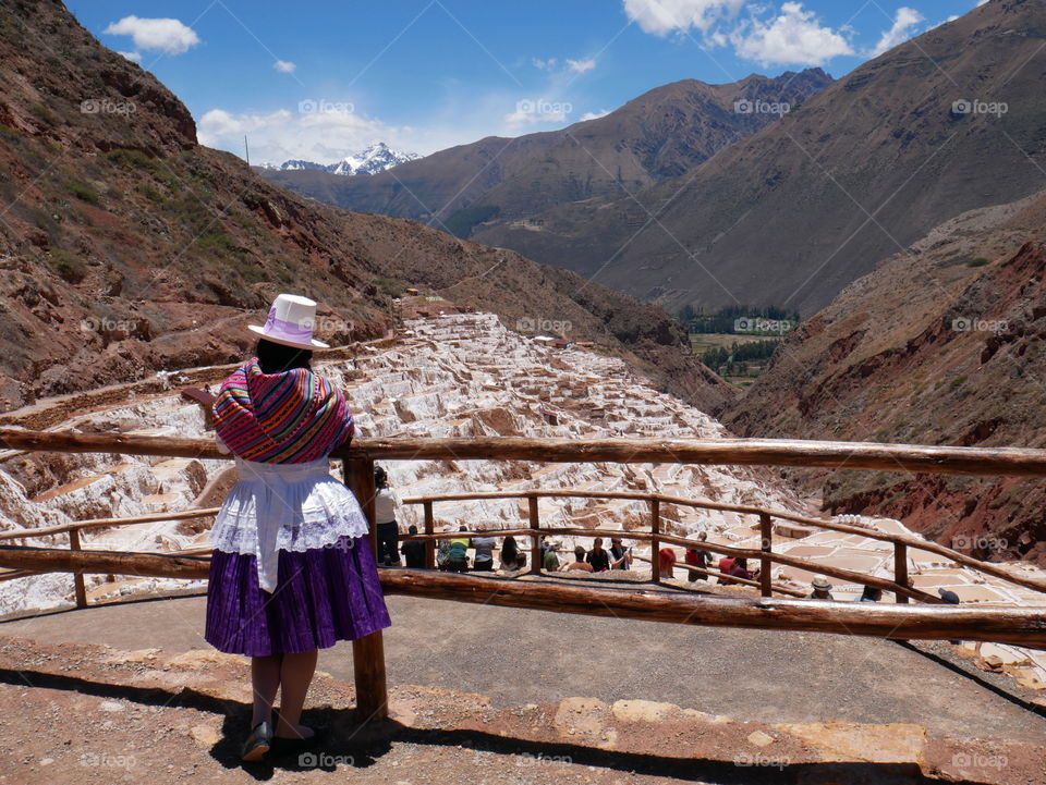 Local woman in salt mines in Peru
