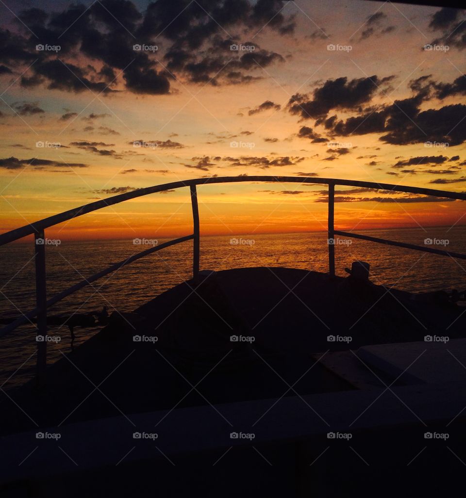 Sunrise . Sunrise over the Atlantic Ocean from a  clamming vessel 