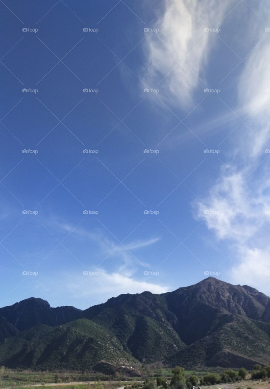 green sky and mountain