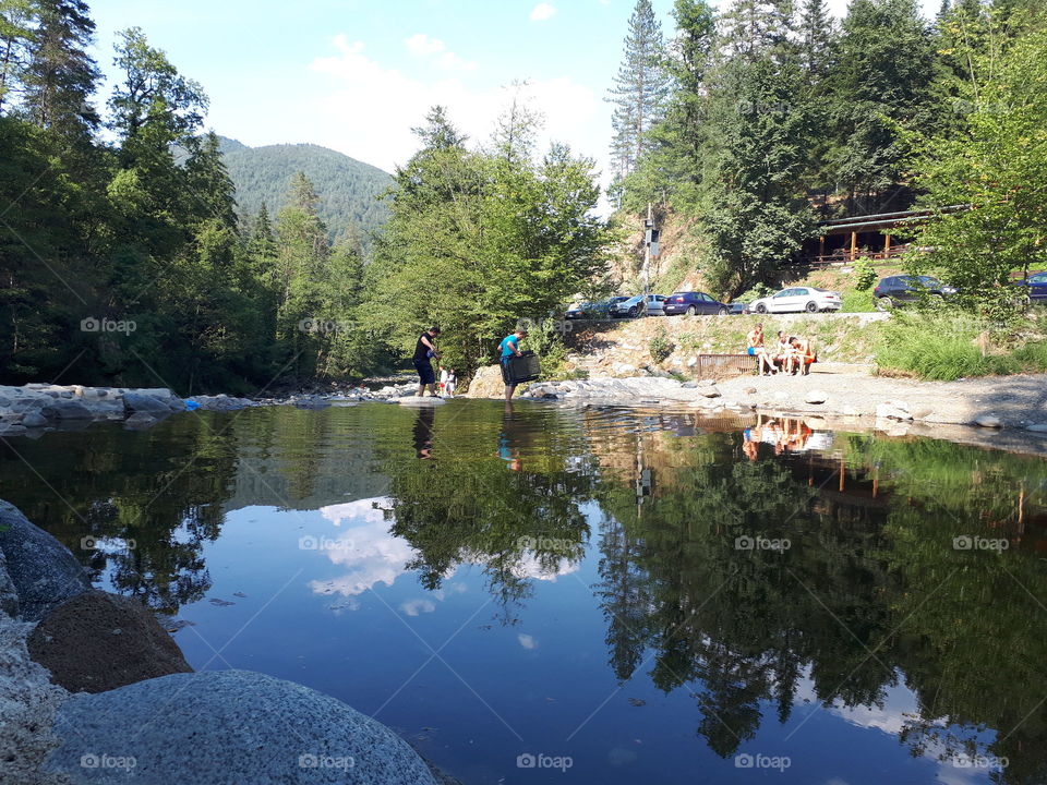 rest and recreation in nature on the river and waterfall Kamenica