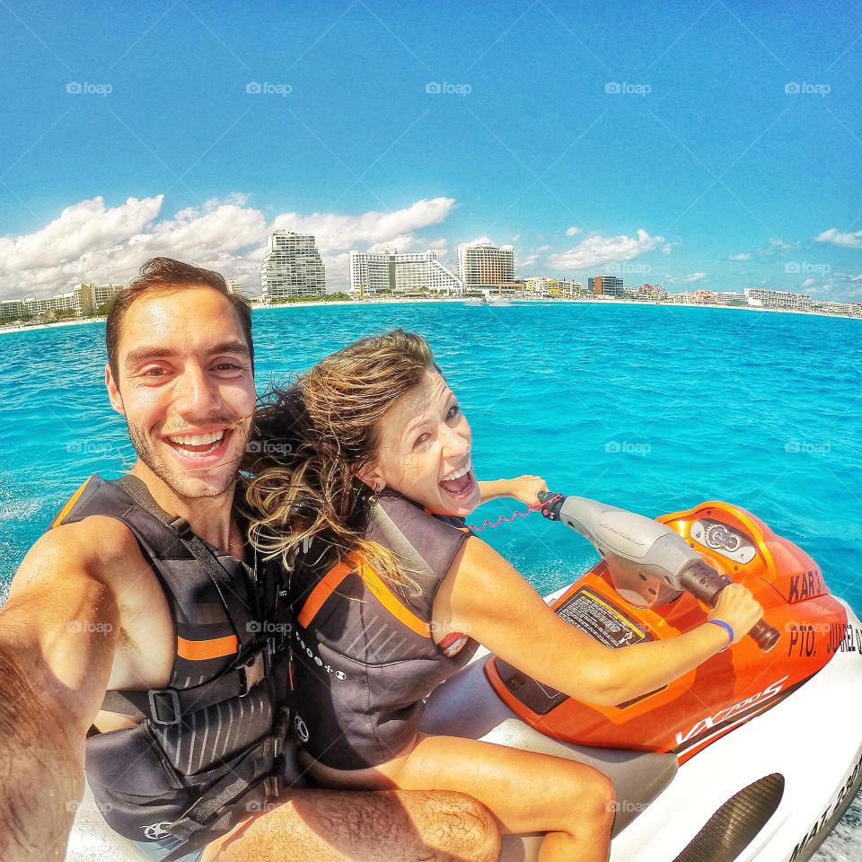 Portrait of cute couple on boat