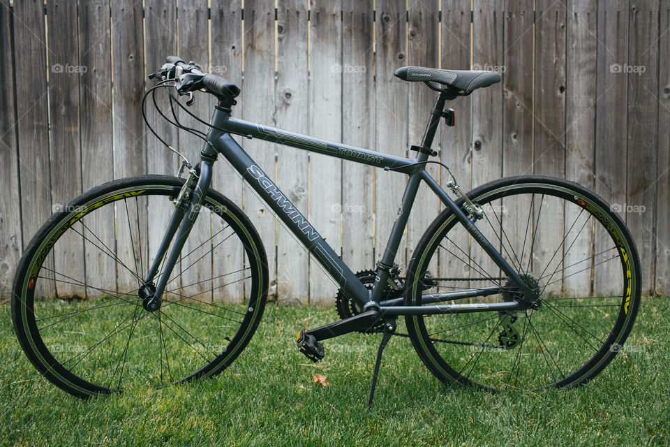 Road bike parked on grass 