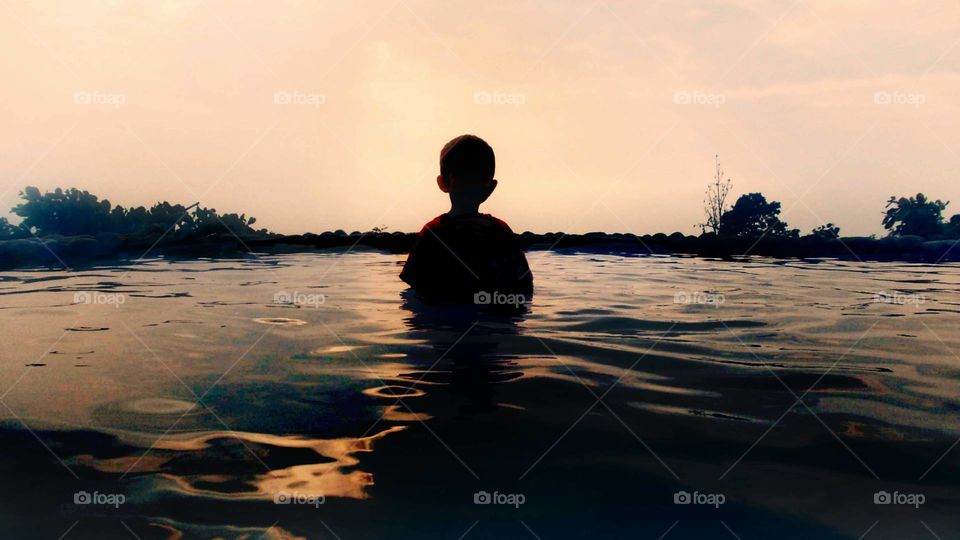 spending hours in pool at sunny days won't be long enough..especially for this young boy..