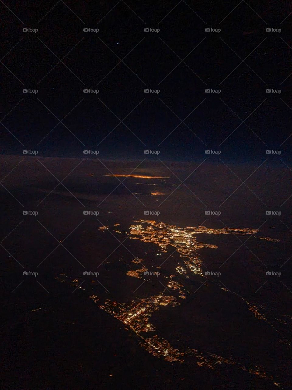 The town of St. George Utah seen from 30,000 feet on a clear night