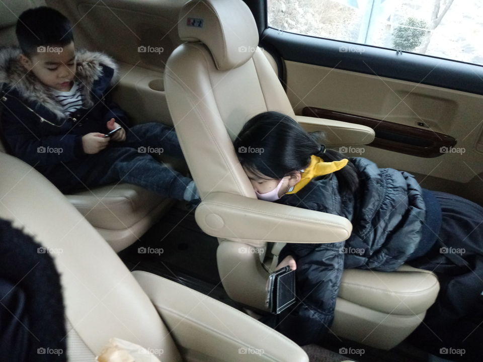 because of long hours to travel to the city, this kids getting bored from staying still.  they do their own business