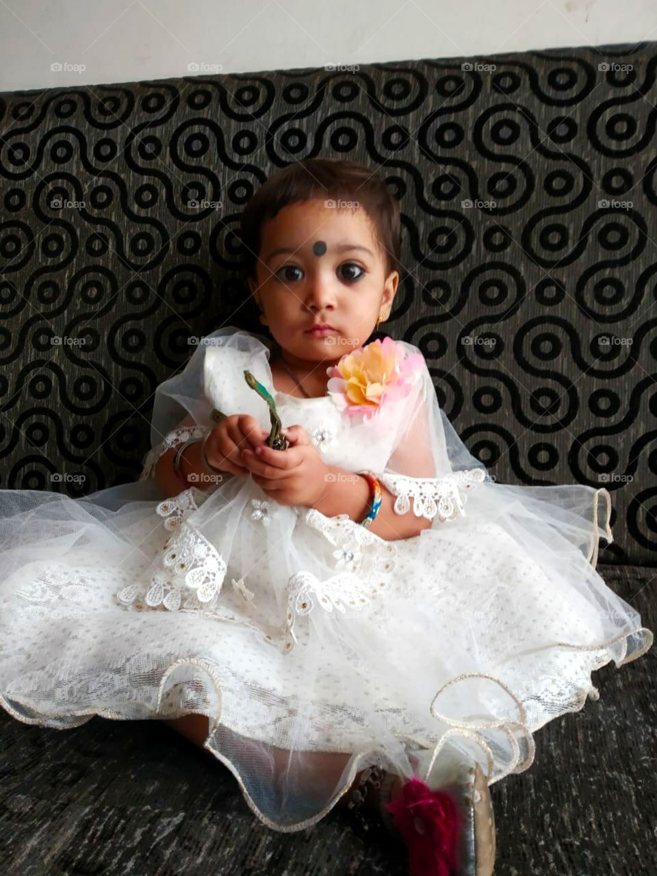 Cute white dressed Angel cute looking pose on camera