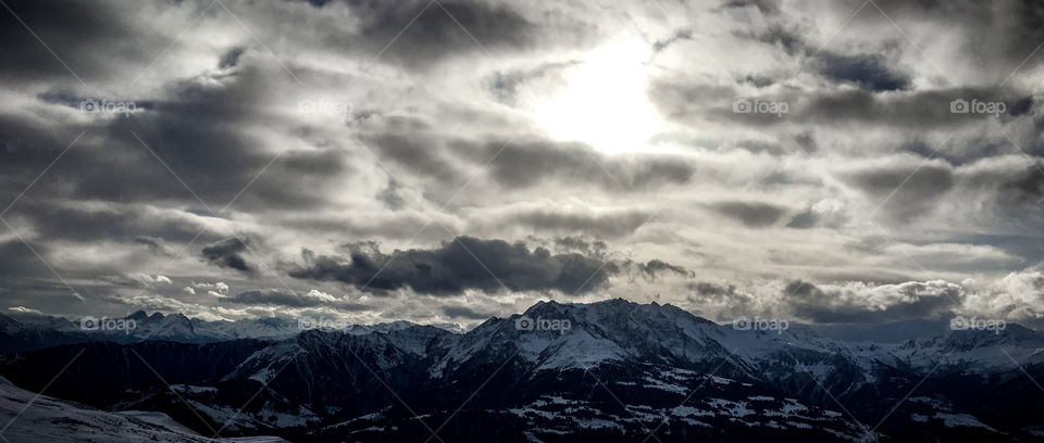 Swiss Alps with high contrast clouds