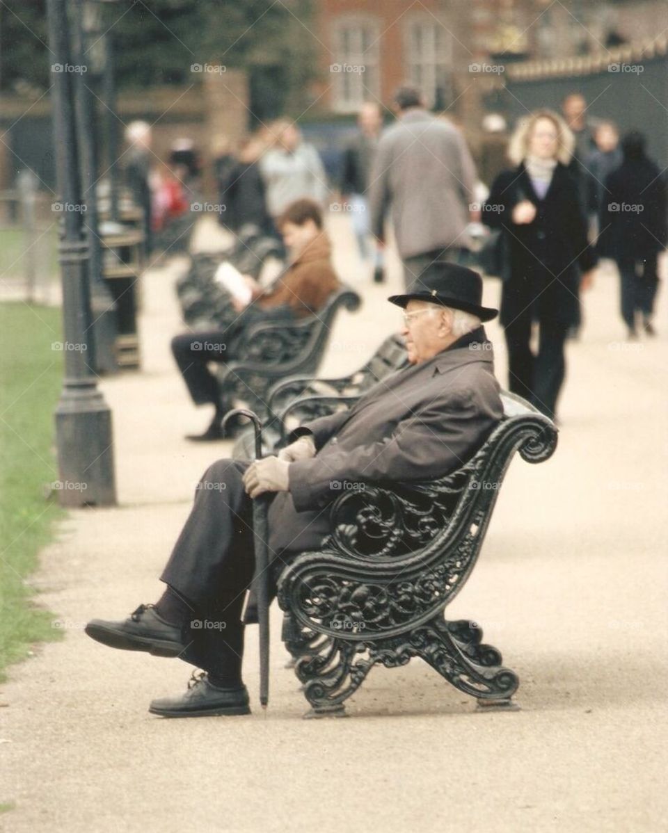 Man on bench in London