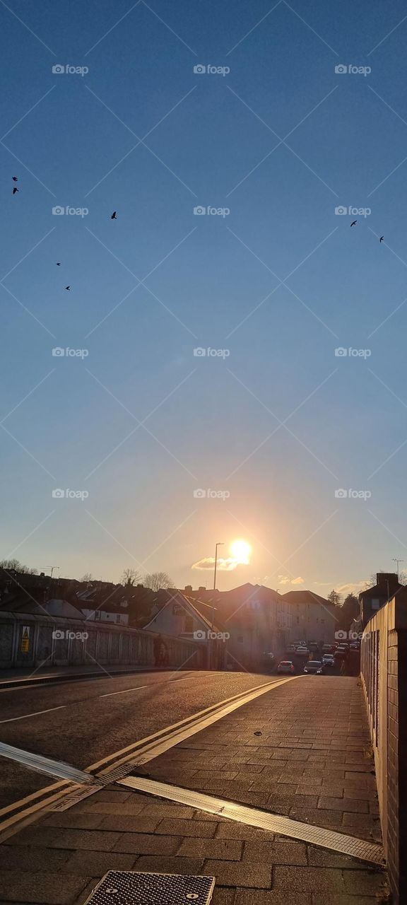 sunset over a quiet road