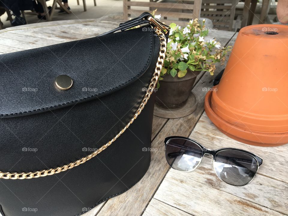 Fashion handbag designer sunglasses Sunday lunch 