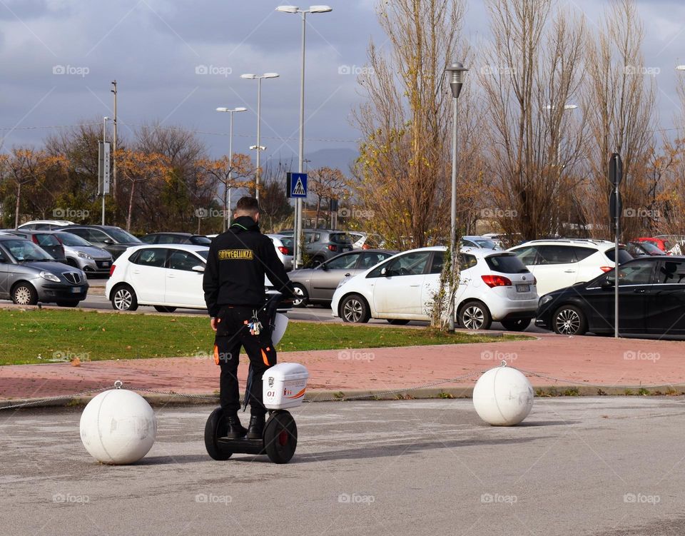 in motion with electric kick scooter