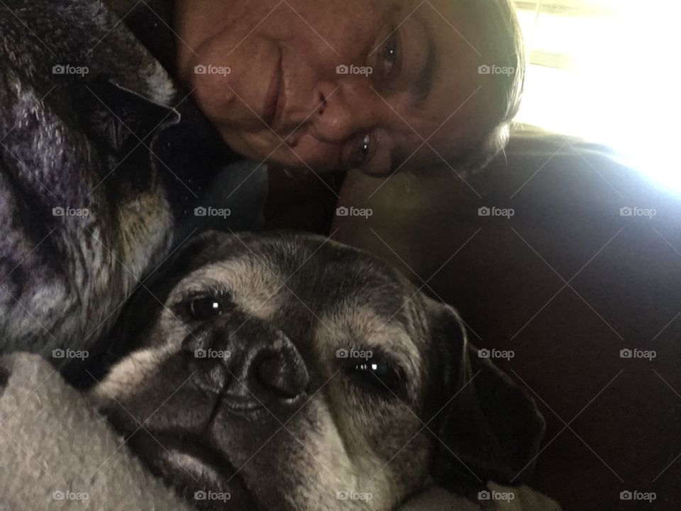 My mommas giving me lots of love and ice cream too! Enjoying my snuggles from my momma.