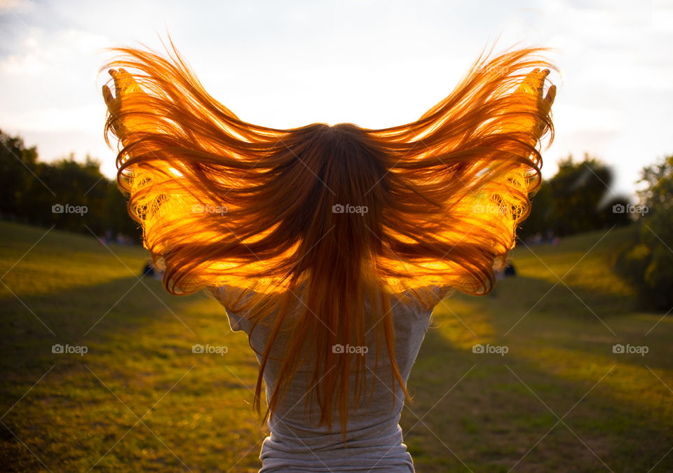 Red hair on wind