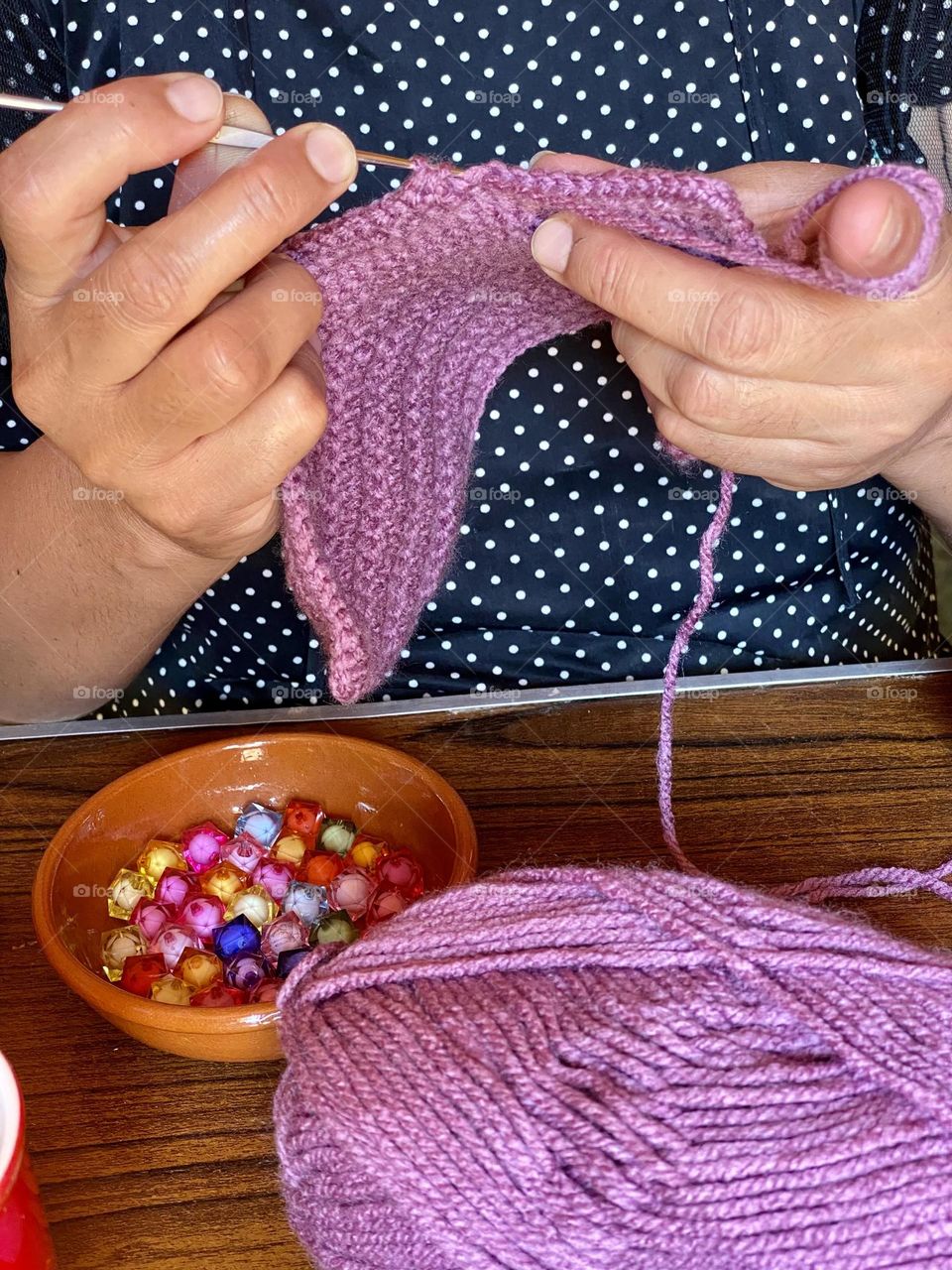 Making handmade woolen clothes 