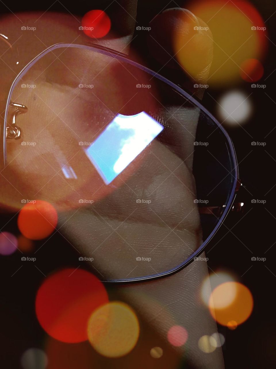 reflections of sky on glasses