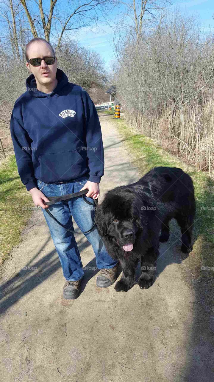A happy guy and his puppy