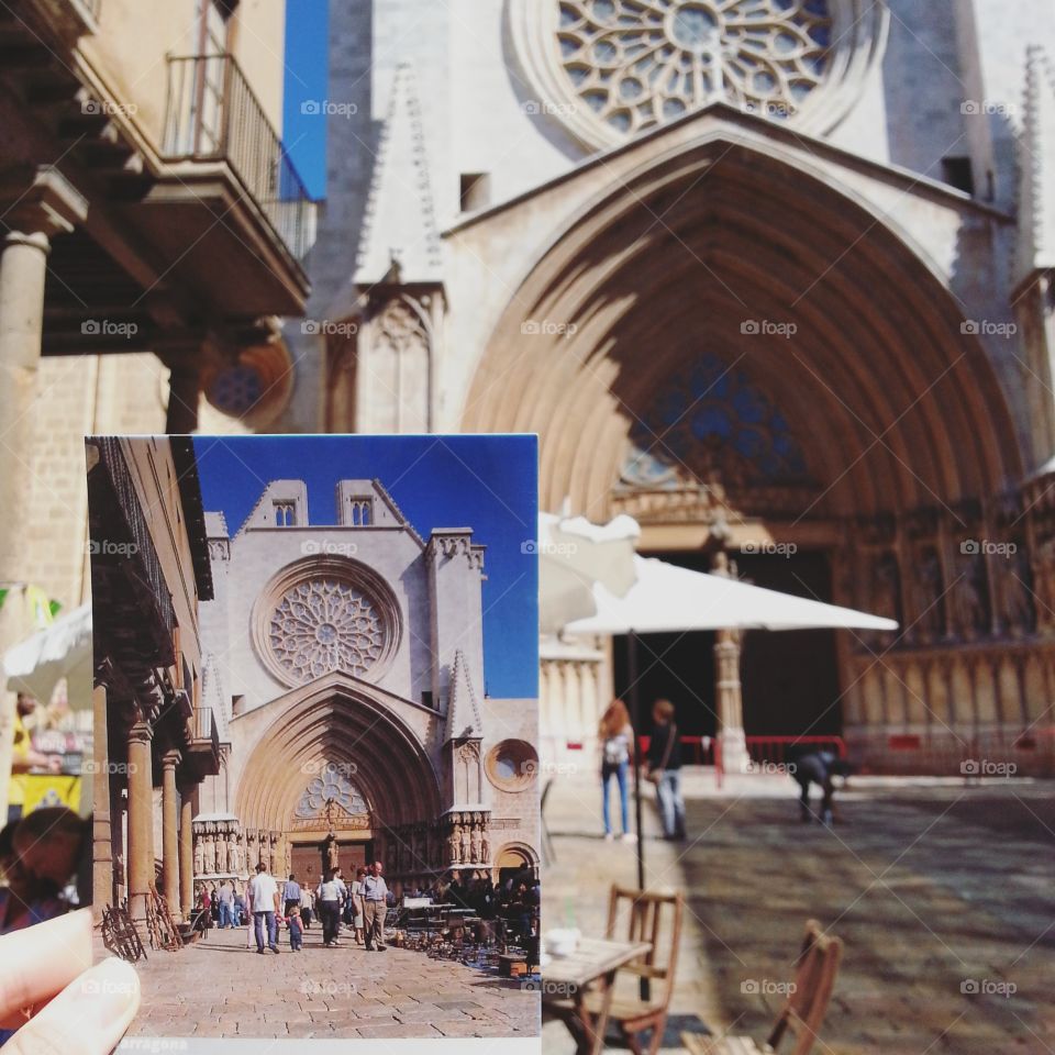 View of the Cathedral Basilica of Santa Maria de Tarragona on a background of cards with the same kind