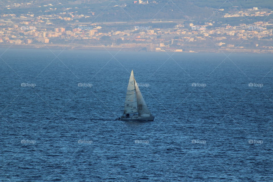 Sailboat in the ocean. Amalfi Coast,  Italy.