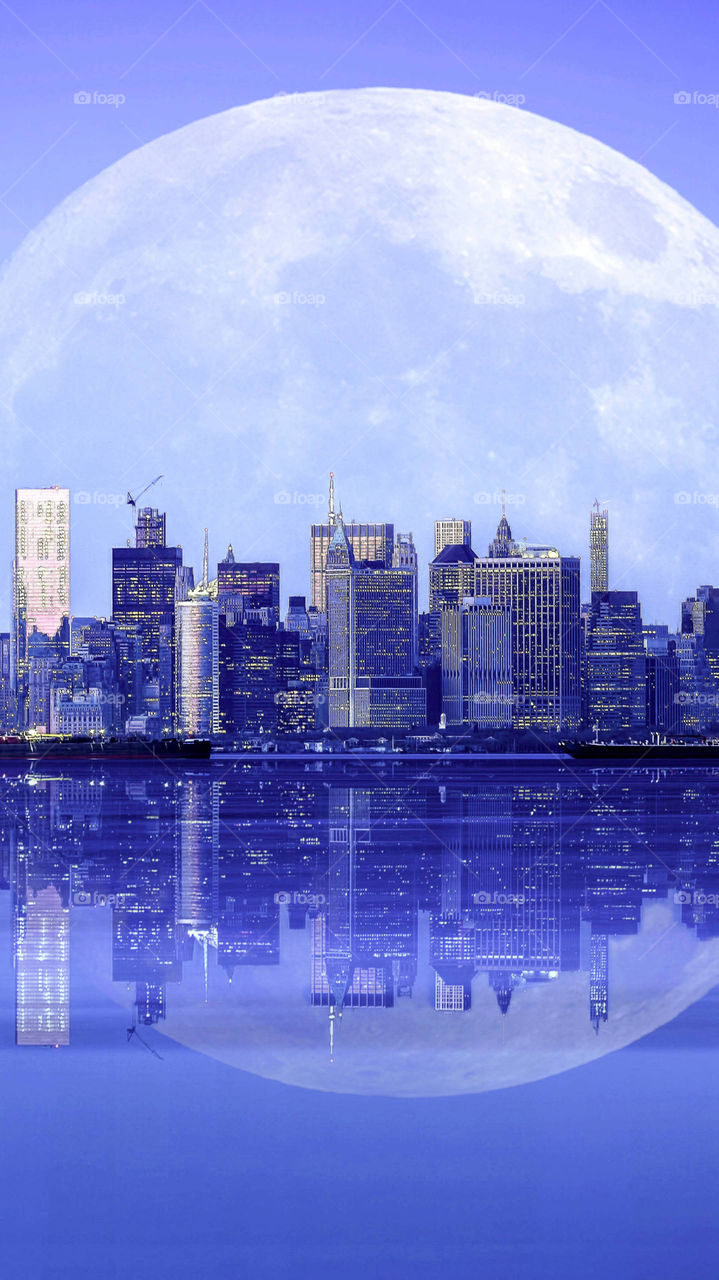 The moon hugging the city