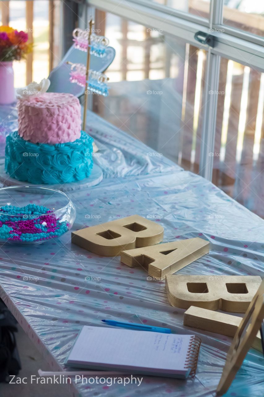 Baby gender reveal table set up. 