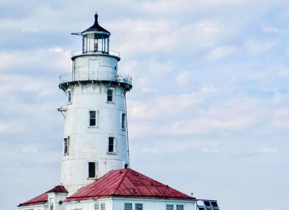 The Chicago Harbor Lighthouse as seen from a tour boat.