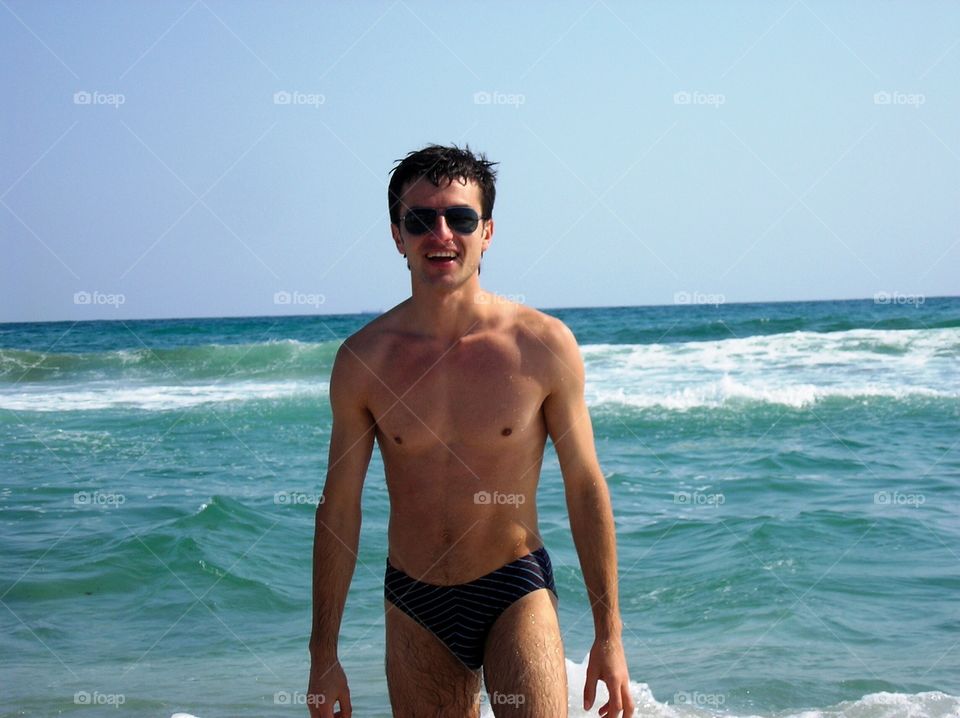 Man smiling in the sea