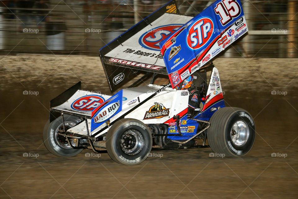 Donny Schatz racing his STP Oil Treatment Outlaw Sprint Car racing at The World Famous Legendary Bullring River Cities Speedway 