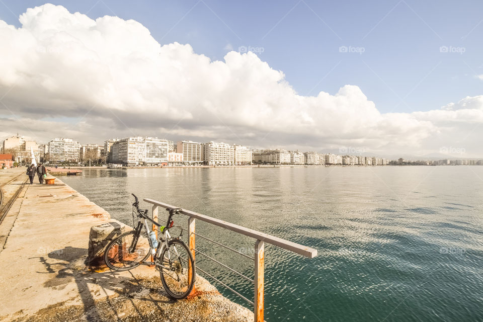 A parked bicycle on the seafront