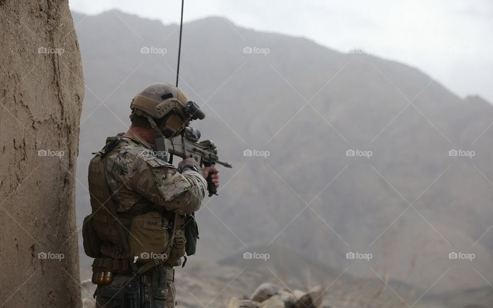American Soldier Scouting A Position