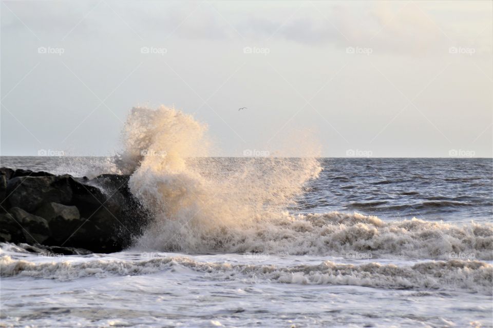 Stormy water on the beach pier