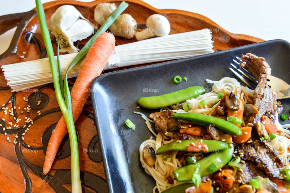 Raw food and prepared food on table