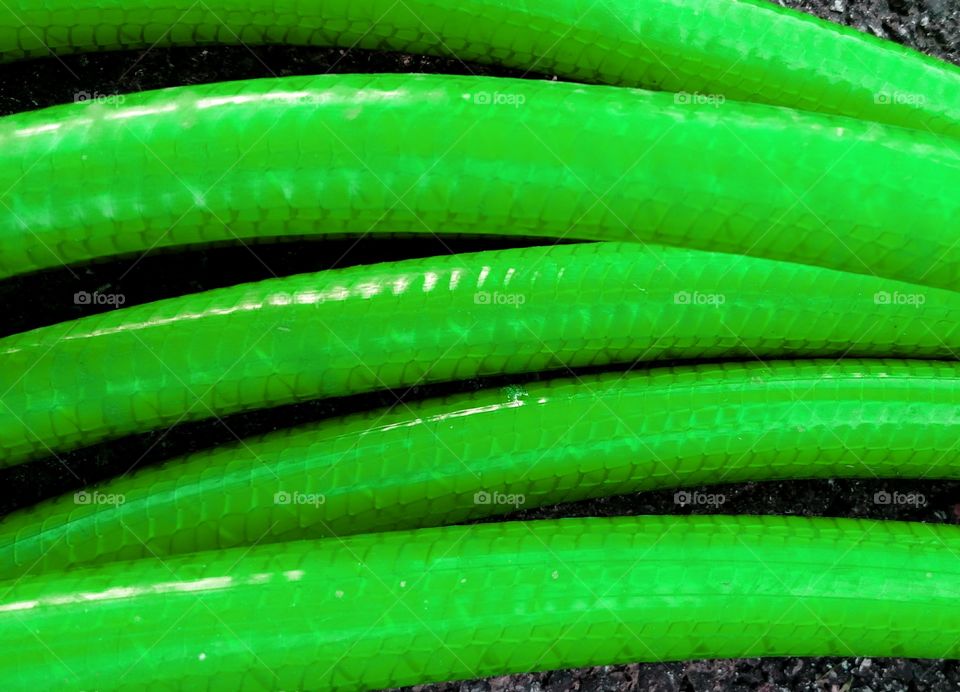 garden hose coil green plastic