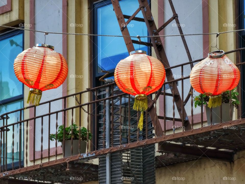 Red Paper Lanterns Adorning A Balcony