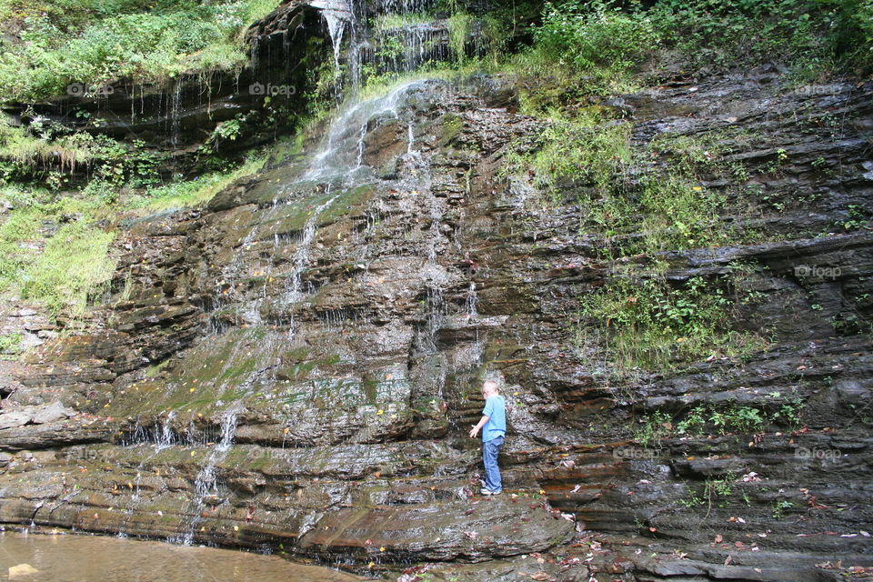 Playing in a waterfall 