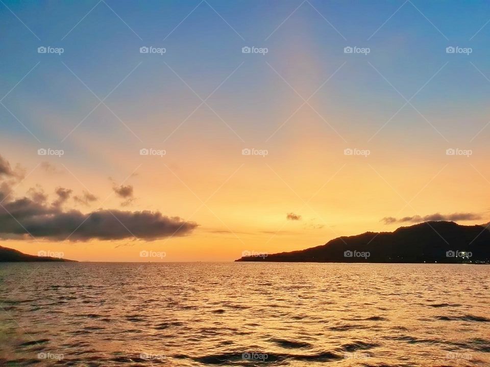 environment sunshine reflection peaceful day island air calm coast abstract tropical vacation golden panoramic tree season tranquil atmosphere tourism scenery seascape cloudy paradise natural panorama weather heaven clouds cloudscape bright scene col