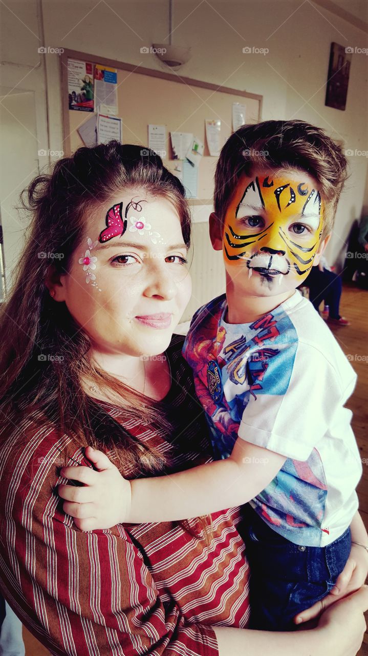 Mother and son with face painting