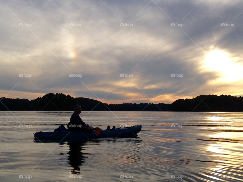 Nighttime is coming. Evening lake paddle