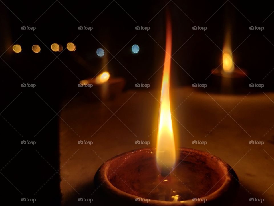 light of a diya.