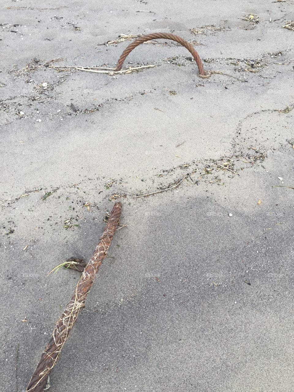 Rustic cable stuck in the sand