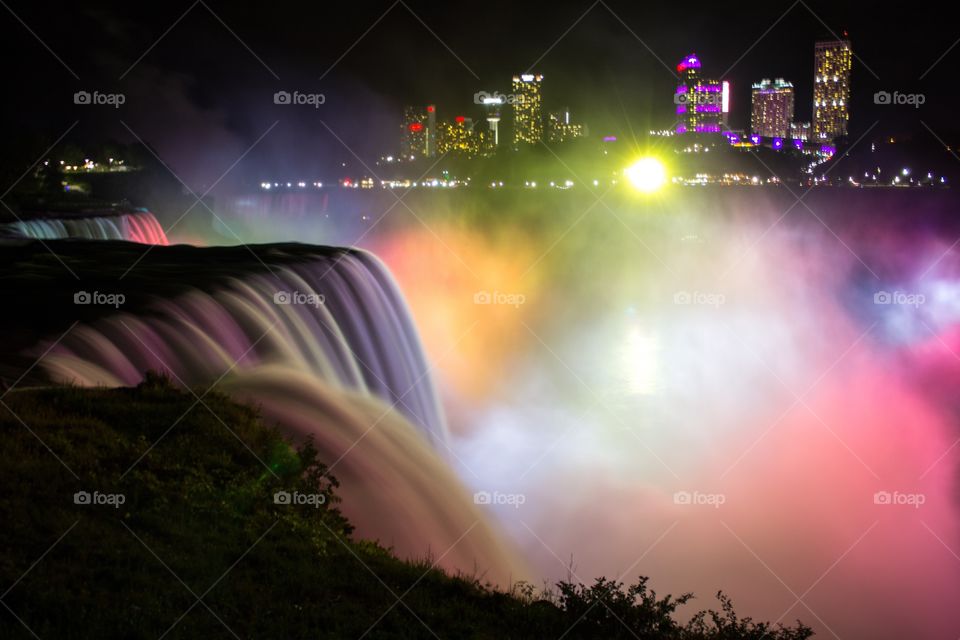 Niagara falls illuminated at night