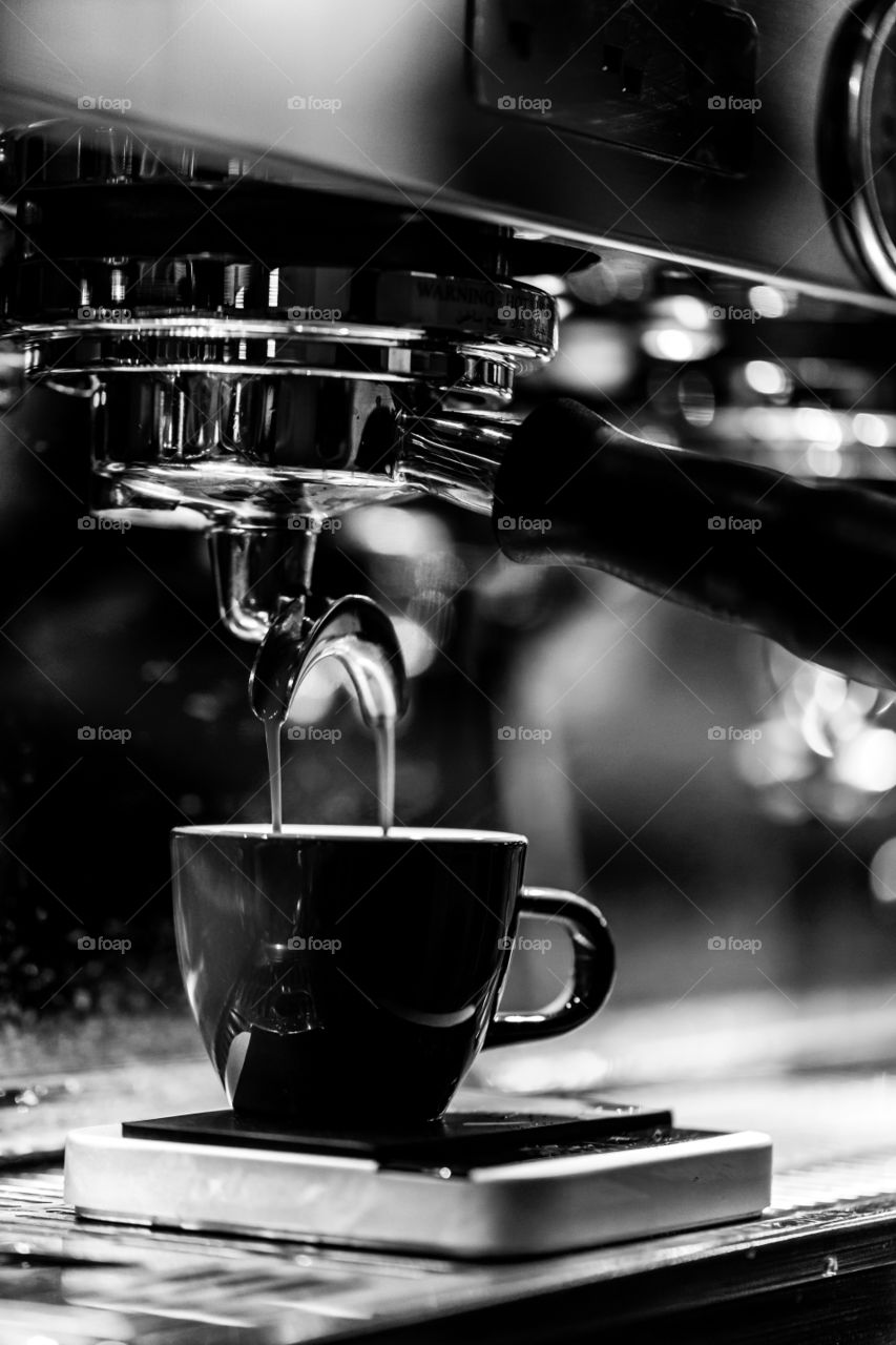 Cup of coffee at the cafe in monochrome