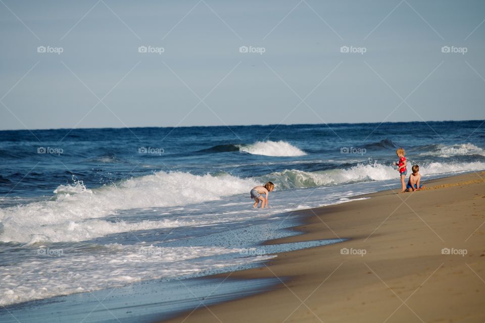 Children at play on the beach 